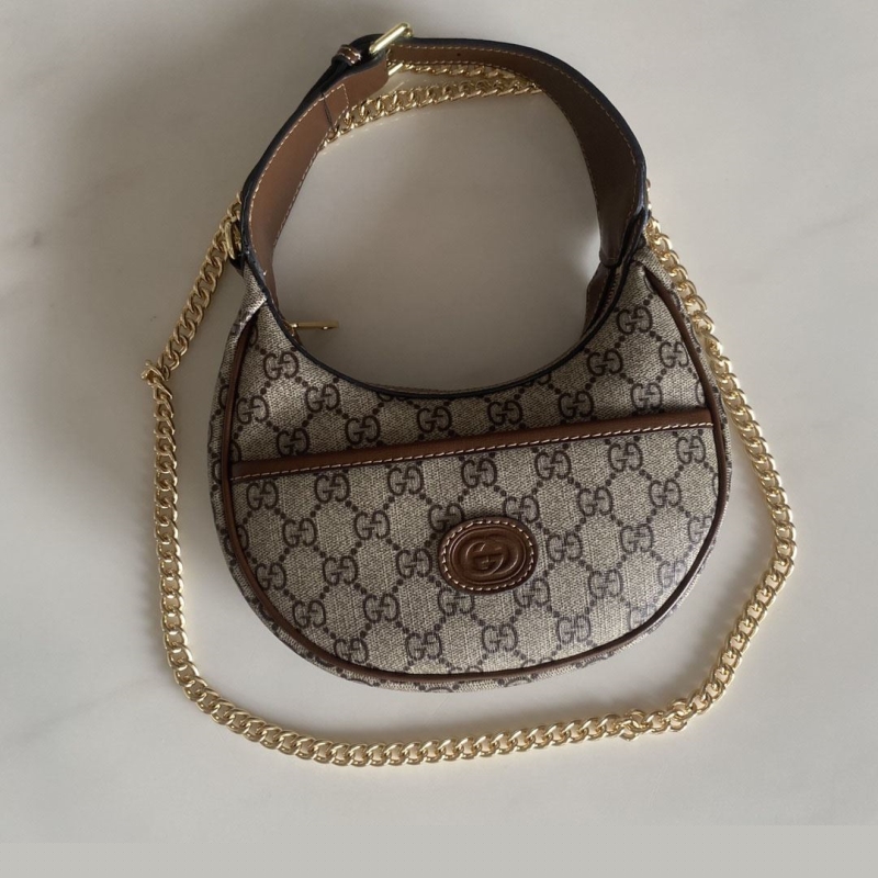 G*u*i top handle bags
